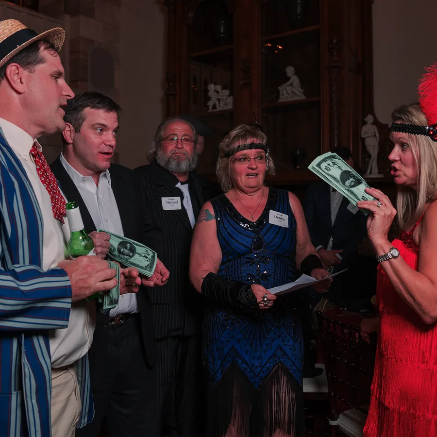 Guests at a Murder Mystery Company public dinner show in Cincinnati