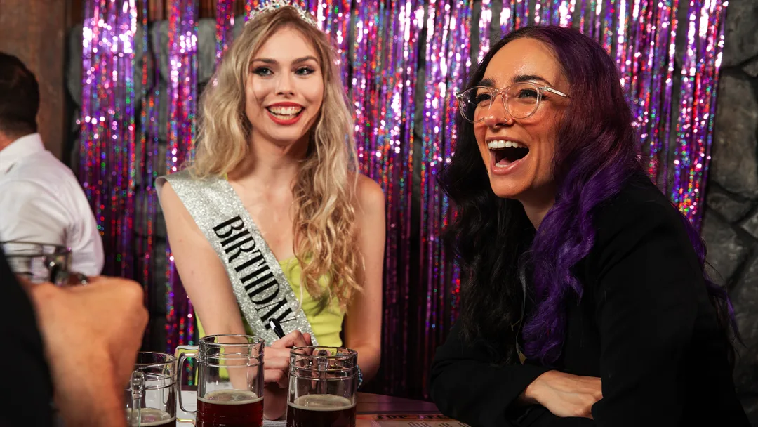 Guests celebrating at a Cincinnati murder mystery party