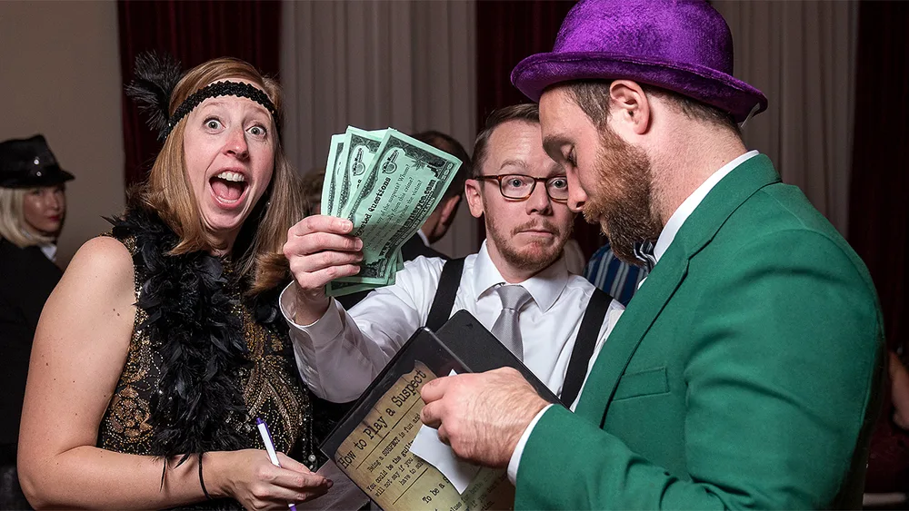 Guests enjoying a Cincinnati murder mystery party